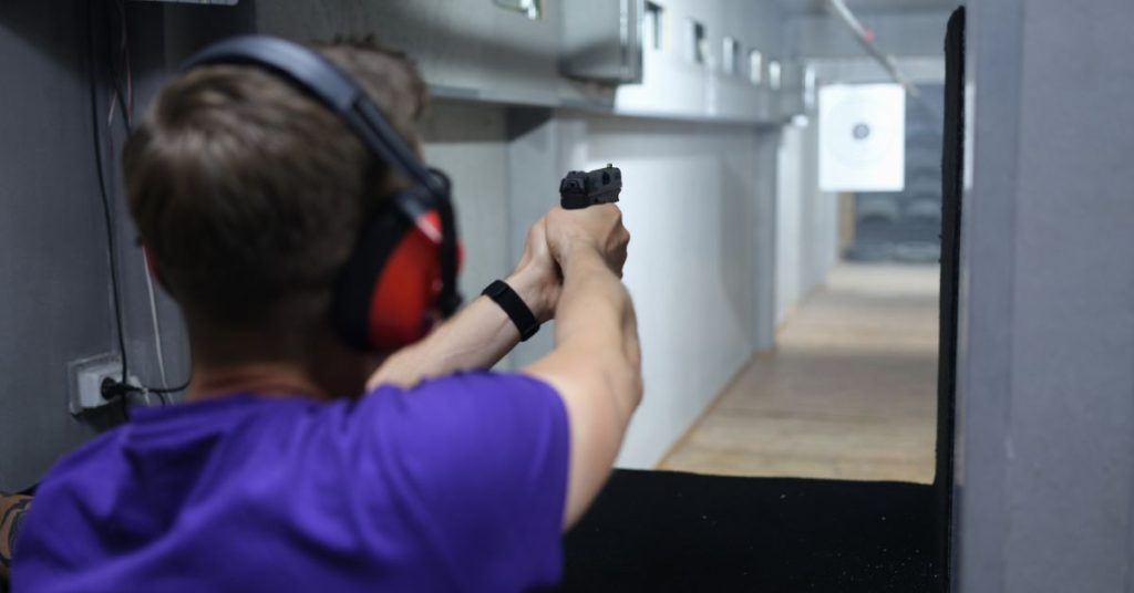 Shooter wearing top-rated hearing protection at the range