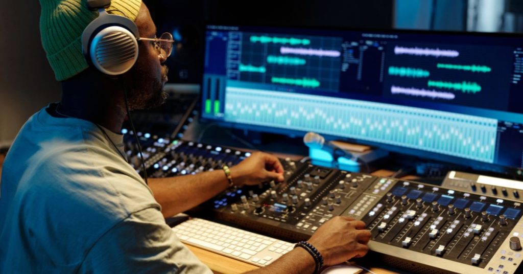 High-fidelity musician earplugs shown on a stage setup