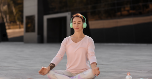 Adult practicing mindfulness meditation to enhance auditory processing