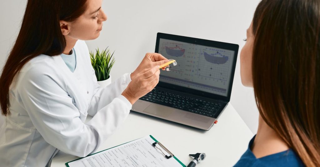 Person using hearing protection in a loud environment