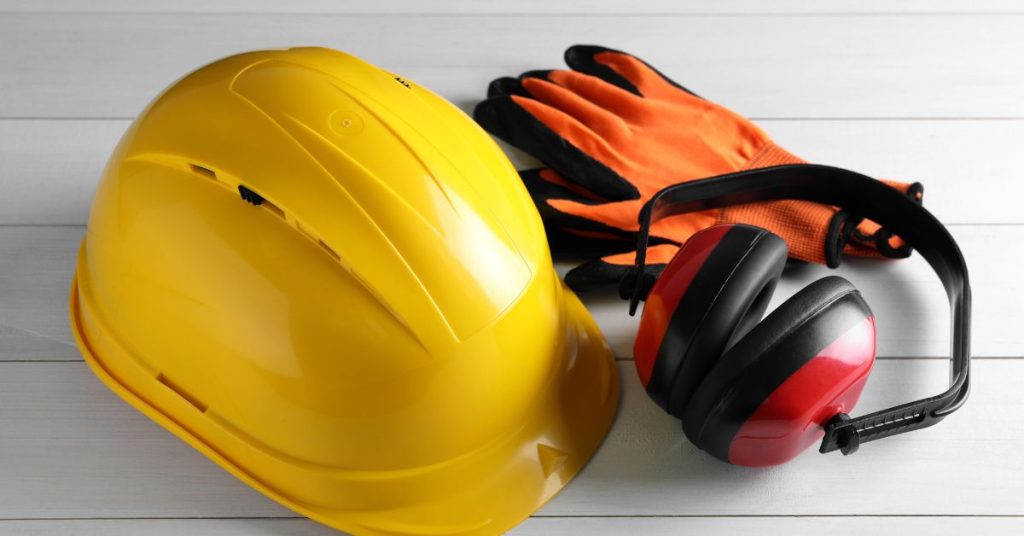 Construction worker wearing hearing protection on a noisy job site