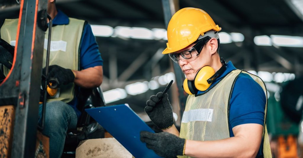 Workers using hearing protection while following 2025 workplace noise regulations