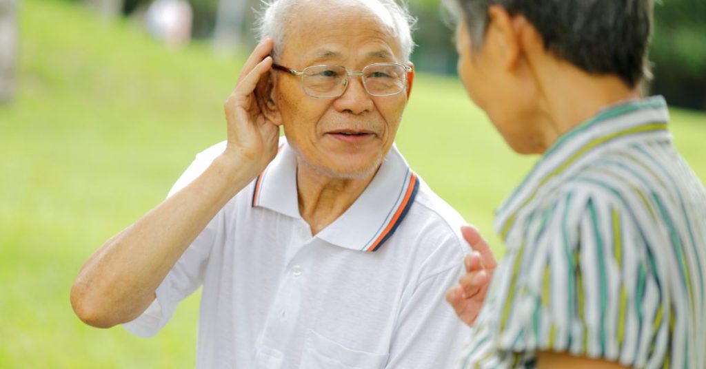 Person with hearing loss using effective communication strategies