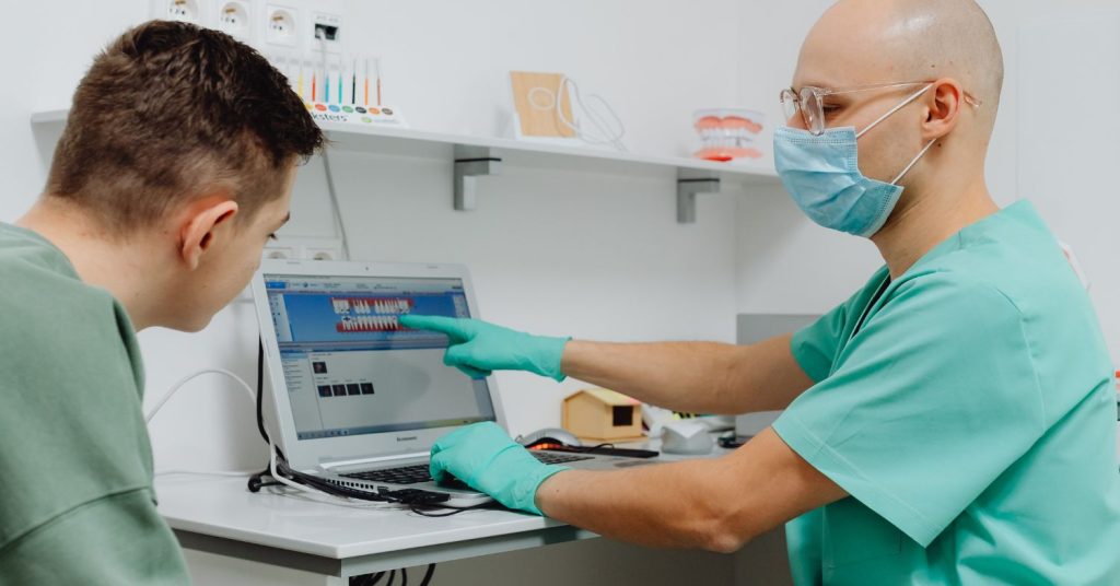 Older adult receiving support for hearing devices through government healthcare