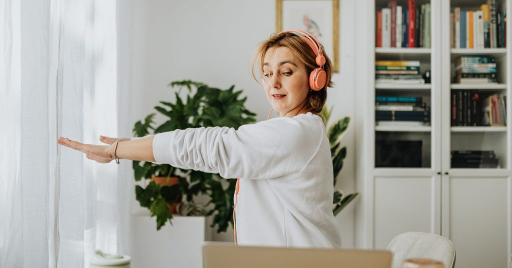 Adult practicing hearing rehabilitation exercises at home
