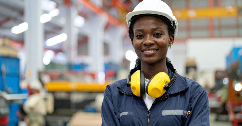 Person wearing earmuffs properly for hearing protection
