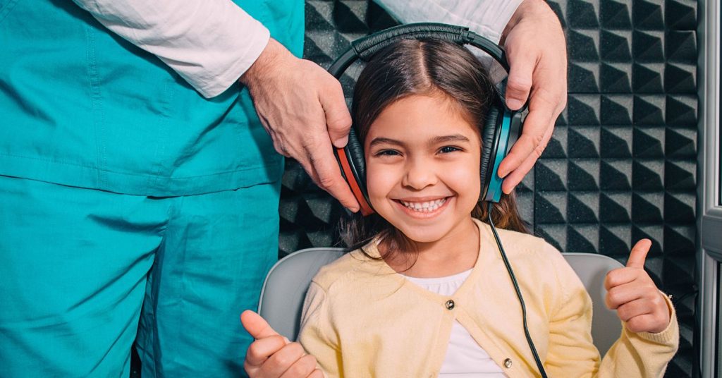 Child undergoing a hearing test to investigate speech delay